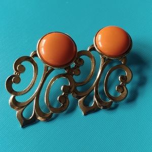 Statement scroll metal clip on earrings